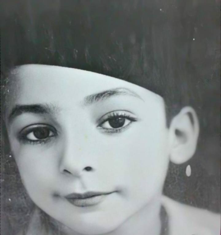 Click to enlarge image rochdi abaza child.png